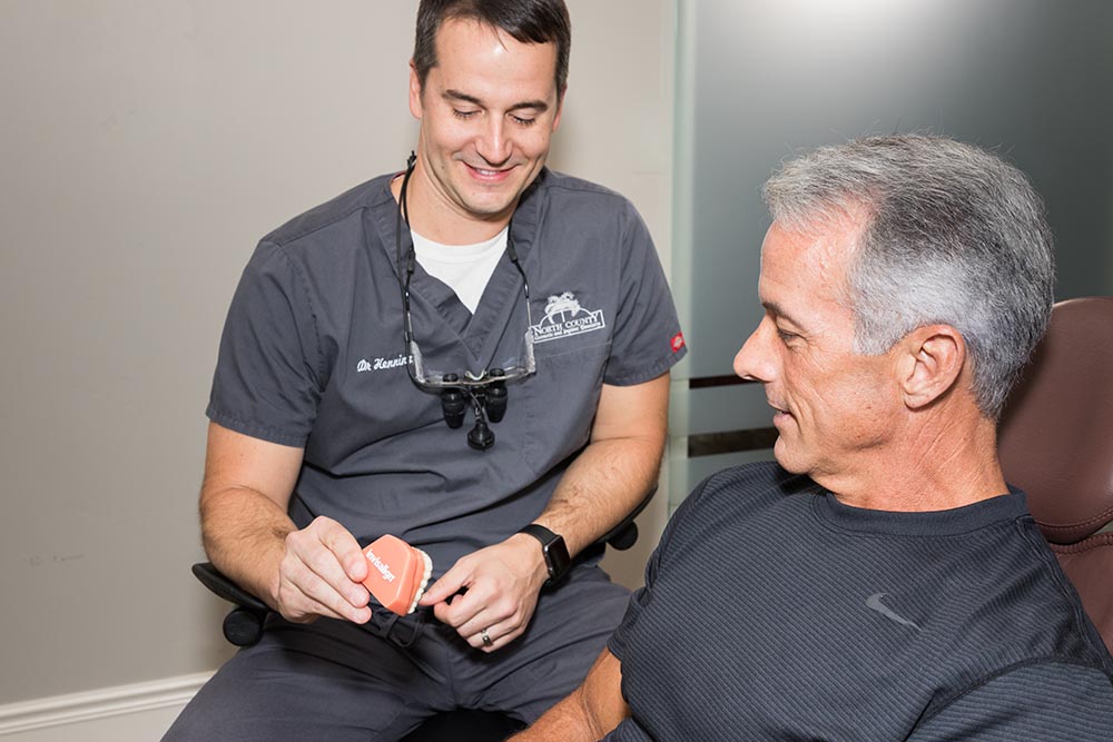 Henninger San Diego Dental Implant Talking to Patient